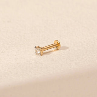 Angle view of Cushion Diamond Nosepin in 14KT Yellow Gold, featuring a cushion-cut diamond with a rounded square shape.