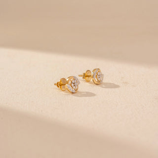 Side view of Floral Cluster Diamond Stud Earrings in 14KT Yellow Gold, featuring round diamond clusters with curved pavé arcs.