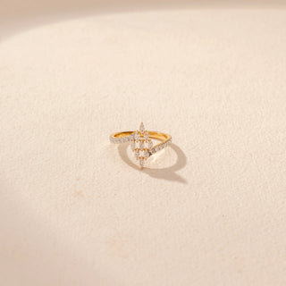 Top view of Floral Cluster Diamond Ring in 14KT Yellow Gold, featuring a pavé leaf-inspired cluster and curved diamond band.