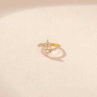 Close-up view of Floral Cluster Diamond Ring in 14KT Yellow Gold, featuring a pavé leaf-inspired cluster and curved diamond band.