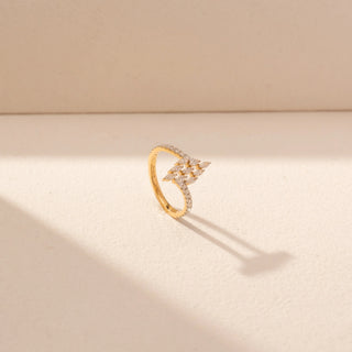 Angled  view of Floral Cluster Diamond Ring in 14KT Yellow Gold, featuring a pavé leaf-inspired cluster and curved diamond band.