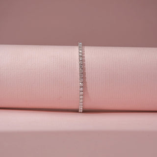 Front view of a 14KT White Gold diamond bracelet featuring a continuous row of rectangular diamond accents.
