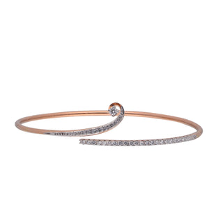 Horizontal view of an elegant female bracelet of size 2.6, on a white background, featuring a slim rose gold bracelet with an eye-catching diamond-studded spiral at one end. The 14 KT rose gold setting with a spring lock showcases 0.64 carats of lab-grown diamonds and the weight is 5.96 grams, creating a sleek, modern design that balances minimalism with luxury against a clean white backdrop.
 