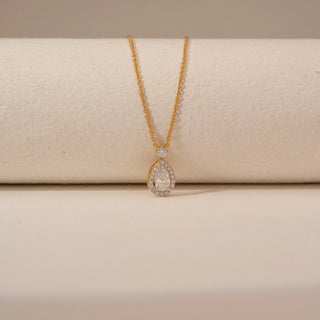 Close-up view of Graceful Pear Teardrop Diamond Necklace in 14KT Yellow Gold, featuring a pear-cut lab-grown diamond.
