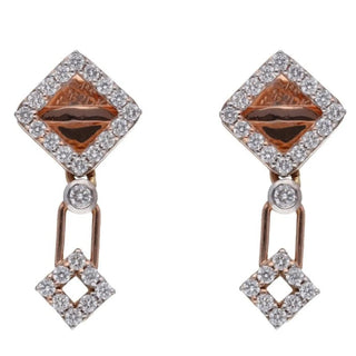 Front view of diamond female Earrings secured with a bombay screw are crafted 14 KT rose gold and feature 0.51 carats of lab-grown diamonds with a total product weight of 3.73 grams. The design highlights two interlocking rhombus shapes, each adorned with sparkling diamonds, creating a dazzling and contemporary look. Displayed on a white background, the earrings' intricate details and elegant craftsmanship are beautifully showcased.