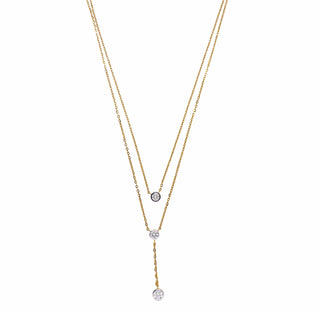 A front view of a 1.61 carat with a solitaire of 0.67 carats Delicate Layered Lab Grown Diamond Chain female Necklace of size 16 secured with a fish lock in 14 KT Yellow Gold weighing 8.24 grams, displayed on a white background. The necklace features two layered chains with three round diamonds of varying sizes.