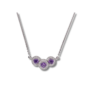 Zoomed in view of a Lab Grown Diamond female Necklace secured with a fish lock, on a white background, crafted in 14 KT White Gold of size 16.5, featuring 0.28 carats of diamonds and a total weight being 5.35 grams. The necklace presents a delicate chain adorned with three round-cut purple gemstones, presumably amethysts, arranged in a descending triangle pattern.