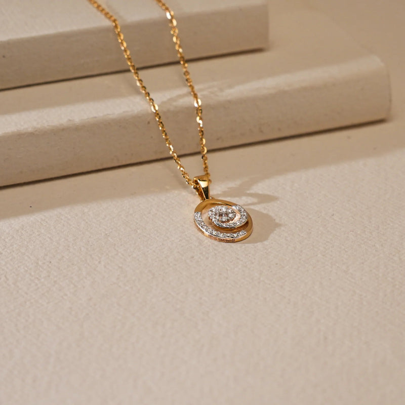 On a white background, the side view of a refined 18 KT yellow gold pendant is displayed, combining classic design with a bold touch of sparkle. With a gross weight of 4.106 grams and a net gold weight of 4.056 grams, it features 0.250 carats of round-cut diamonds, highlighted by a striking 0.24 ct stone. The pendant’s clean lines and radiant finish add timeless elegance, while a secure loop ensures perfect placement for everyday or festive wear.