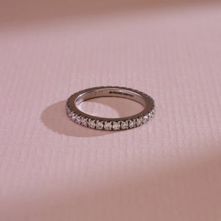 Top view of Reia 14KT White Gold Slim Diamond Eternity Band with EF VVS round-cut diamonds in a seamless circle, symbolising timeless elegance, ideal for stacking or solo wear.