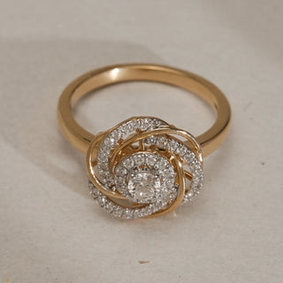 Front view of the Whirling Halo Classic Diamond Ring in 14KT Yellow Gold with EF VVS diamonds totalling 0.371 carats, featuring layered spiral swirls around a central round diamond.