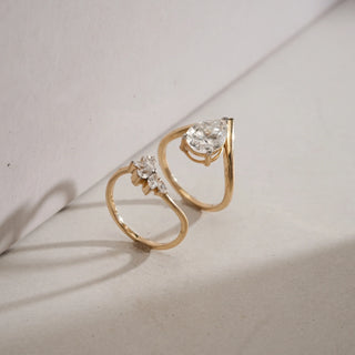 Side view of Blooming Teardrop Diamond Ring in 14KT Yellow Gold, featuring a 2.1 carat pear-shaped centre diamond with marquise floral EF VVS accents totalling 2.438 carats.