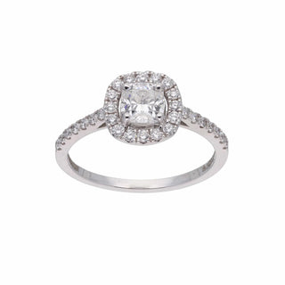 A top view of an ornate diamond engagement female ring of size 11 with a halo design, presented on a white background. The centre stone is a radiant-cut diamond surrounded by a halo of smaller round brilliant diamonds set in 14 KT  white gold. The total lab-grown diamond carat weight is 0.83 carats with a solitaire of 0.54 carats and the weight of the product is 1.72 grams, providing a brilliant and sparkling appearance to this elegant ring.