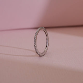 Side view of 14KT White Gold Classic Diamond Eternity Band Ring, showcasing EF VVS round pavé-set diamonds in a sleek circle design, perfect for weddings, anniversaries, or stacking elegance.