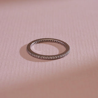 Top view of the 14KT White Gold Classic Diamond Eternity Band Ring, featuring EF VVS round pavé-set diamonds in a continuous circle, symbolising infinite love and timeless sophistication.
