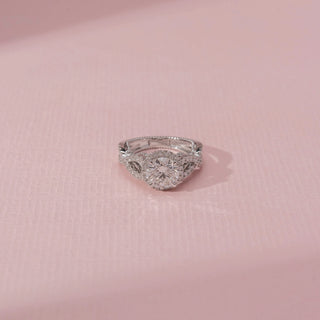 Close-up view of Round Halo Diamond Ring in 14KT White Gold, featuring a round diamond with a pavé halo and split shank.