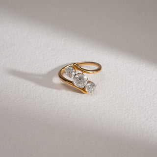 Top view of the Asymmetric Threefold Gold Diamond Ring in 18KT yellow gold. The ring highlights three EF VVS round diamonds with a 1.01-carat solitaire as the centrepiece, flanked by two smaller stones. With a total diamond weight of 1.9 carats and product weight of 4.52 grams, it balances luxury and contemporary elegance.