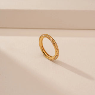 Angled view of Graceful Interlocking Diamond Band Ring in 14KT Yellow Gold, featuring round brilliant lab-grown diamonds.