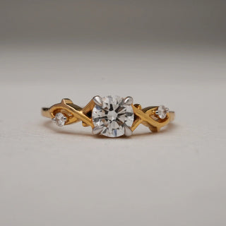 Close-up front view of 14KT Yellow Gold Solitaire Vine Diamond Ring with round EF VVS solitaire and vine-accented side diamonds, crafted for timeless brilliance and elegant natural charm.