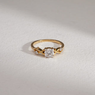 Top view of 14KT Yellow Gold Solitaire Vine Diamond Ring with round EF VVS solitaire and vine-accented diamonds, crafted for timeless sparkle and elegant everyday sophistication.