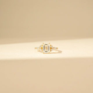 Front view of Emerald-Cut Diamond Ring in 14KT Yellow Gold, featuring an emerald-cut centre diamond and marquise side diamonds.