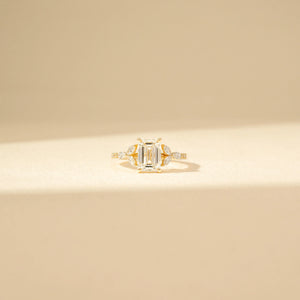 Refined Emerald Symphony Diamond Ring