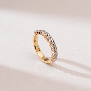 Angled view of the Double Row Shimmering Diamond Ring in 14KT yellow gold, featuring two parallel rows of round brilliant diamonds—one larger set and one pavé-set—on a polished band against a neutral background.