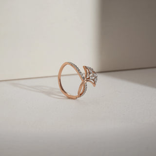 Front angled view of the Suspended Charm Diamond Ring in rose gold, size 13, crafted in 14KT hallmarked gold. The design features a floating diamond cluster framed within an open diamond-studded shape. Pavé-set EF colour, VVS clarity lab-grown diamonds extend along the split shank, creating a refined, airy silhouette.