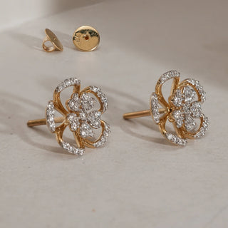 Front view of Rose Bloom Open Diamond Stud Earrings in 14KT Rose Gold, featuring a floral petal design with EF-VVS pavé-set lab-grown diamonds and secure Bombay screw backs.