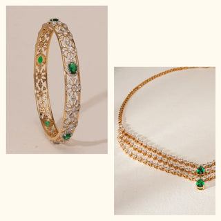 Ornate lab-grown diamond bangle and matching necklace by Réia featuring floral motifs with green gemstone accents, displayed in angled and flat product views on a soft ivory background under warm lighting.