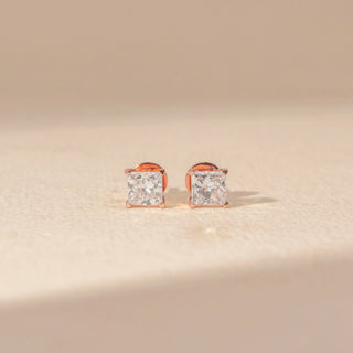 Front view of Square Diamond Stud Earrings in 14KT Rose Gold, featuring matching square-cut diamonds in four-prong settings.