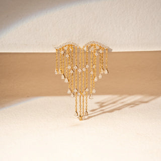 Front view of 14KT Yellow Gold diamond fringe earrings featuring curved pavé-set tops and cascading diamond chains.