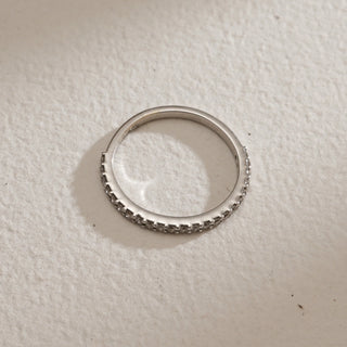 Top view of 14KT White Gold Eternal Whisper Diamond Eternity Band with EF VVS pavé-set round diamonds totalling 0.31 carats, crafted for timeless elegance and perfect stacking versatility.