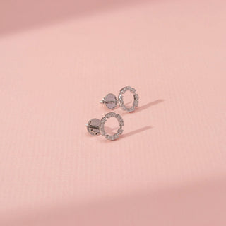 Side view of Circular Diamond Earrings in 14KT White Gold, featuring round lab-grown diamonds in a delicate halo design.