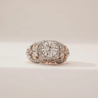 Front view of Ornate Vintage Halo Diamond Ring in rose gold, featuring a round lab-grown centre diamond with a square halo and intricate marquise and round diamond detailing along the shoulders.