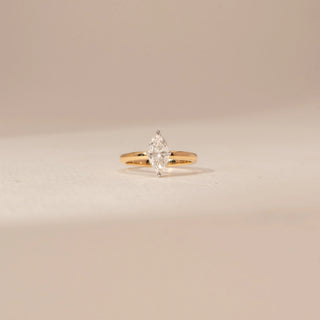 Front view of a 14KT Yellow Gold diamond ring with two marquise-shaped diamonds arranged vertically in a four-prong setting.