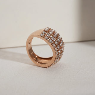 Side angle view of the Crystal Matrix Diamond Ring in 14KT hallmarked rose gold, featuring a bold crisscross matrix design fully set with EF VVS round-cut diamonds. The intricate lattice sparkle highlights the craftsmanship, giving a structured yet elegant aesthetic.
