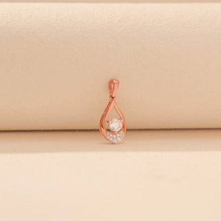 Front view of Teardrop Diamond Pendant in 14KT Rose Gold, featuring a round lab-grown diamond and pavé-set diamonds.