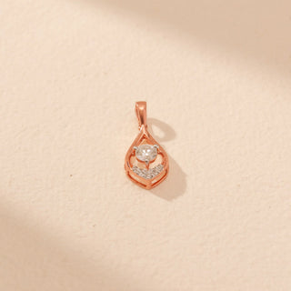 Top view of Teardrop Diamond Pendant in 14KT Rose Gold, featuring a round lab-grown diamond and pavé-set diamonds.