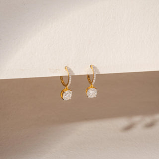 Side view of diamond drop earrings in 14KT yellow gold, featuring pavé hoops and round lab-grown diamond drops.