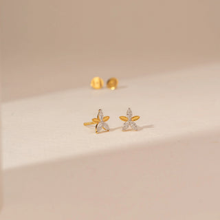 Angled view of Graceful Blossom Petal Diamond Earrings in 14KT Dual Gold, featuring marquise-cut lab-grown diamonds.