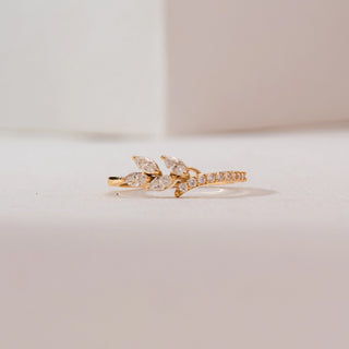 Front view of Marquise Leaf Branch Diamond Ring in 14KT yellow gold, featuring marquise-cut diamonds arranged like leaves with a curved pavé diamond band.