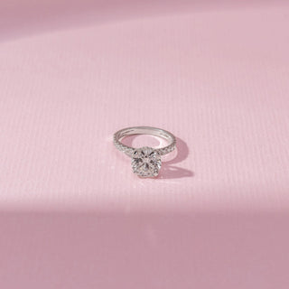 Top view of 14 KT White Gold Round Solitaire Diamond Ring , featuring a round lab-grown diamond and pavé diamond band.