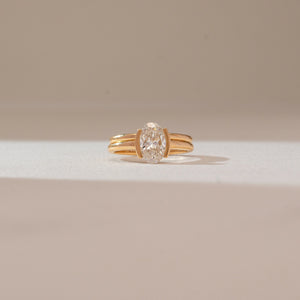 Sleek Oval Bezel Diamond Ring