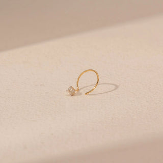 Side view of Round Diamond Nosepin in 14KT Yellow Gold, featuring a round diamond cluster on a delicate open hoop.