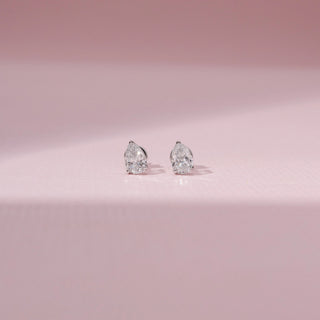 Front view of Pear Cut Diamond Stud Earrings in 14KT White Gold, featuring matching pear-shaped lab-grown diamonds.
