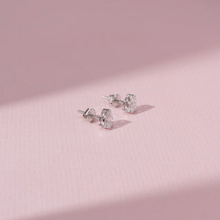 Side view of Pear Cut Diamond Stud Earrings in 14KT White Gold, featuring pear-shaped lab-grown diamonds in secure settings.