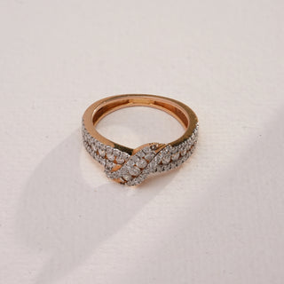 Top view of Infinity Loop Diamond Ring in 14KT yellow gold, highlighting the twisted diamond band design with EF colour, VVS clarity stones. Elegant craftsmanship with 3.49g weight.