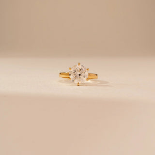 Front view of Dazzling Round Solitaire Diamond Ring in 14KT Yellow Gold, featuring a round brilliant lab-grown diamond.