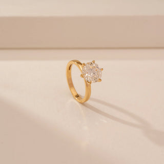 Angled view of Dazzling Round Solitaire Diamond Ring in 14KT Yellow Gold, featuring a round brilliant lab-grown diamond.