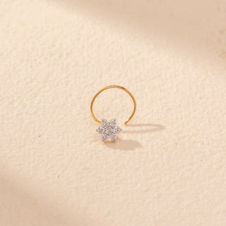 Close-up view of Floral Cluster Diamond Open Nose Ring in 14KT Yellow Gold, featuring a flower-shaped cluster of round diamonds.